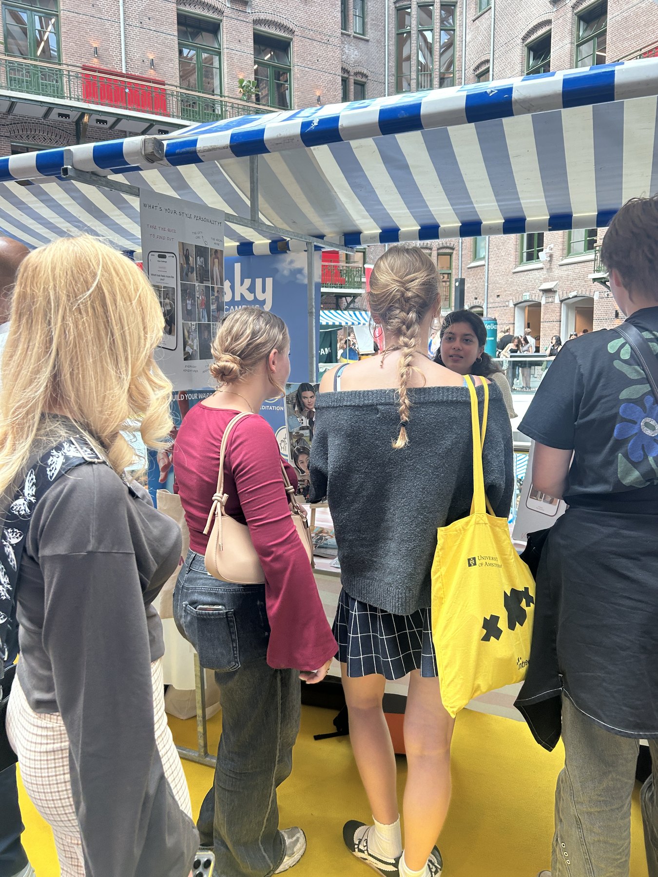 Students gathering around the ViWear stand during Welcome Week